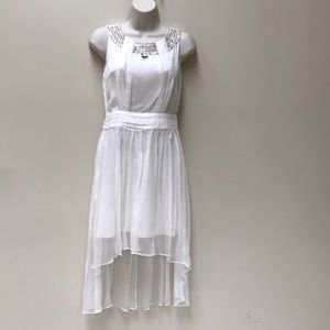 White flowy dress silk.